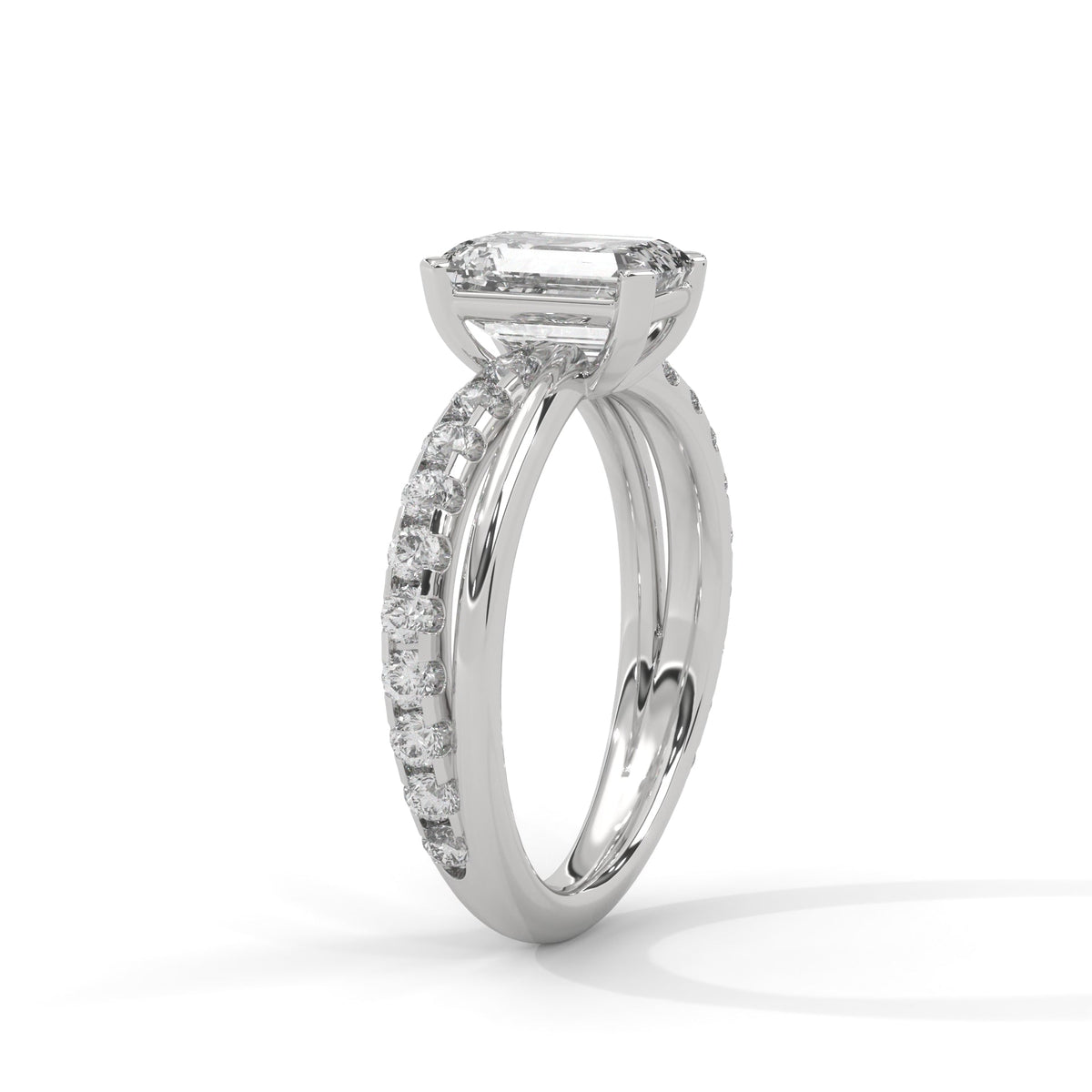 Emerald Cross Solitaire Ring